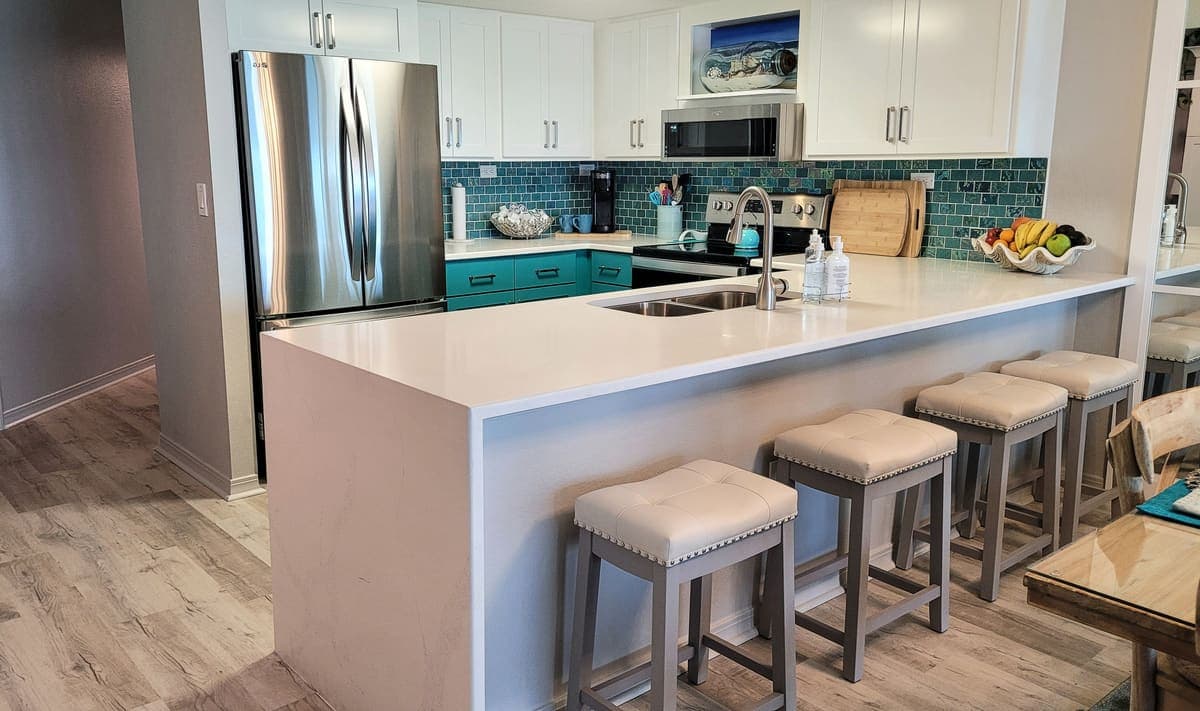 An updated modern kitchen with an island, a common value driver for Florida homes.