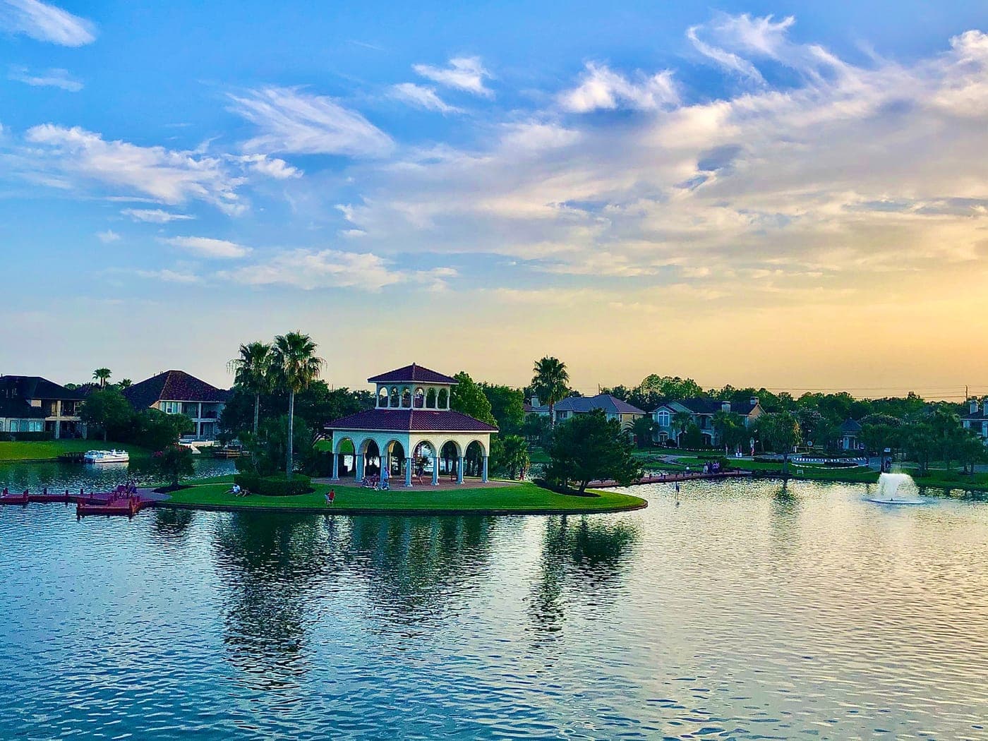 A scenic lake and waterfront homes in Lake County, Florida at sunset.